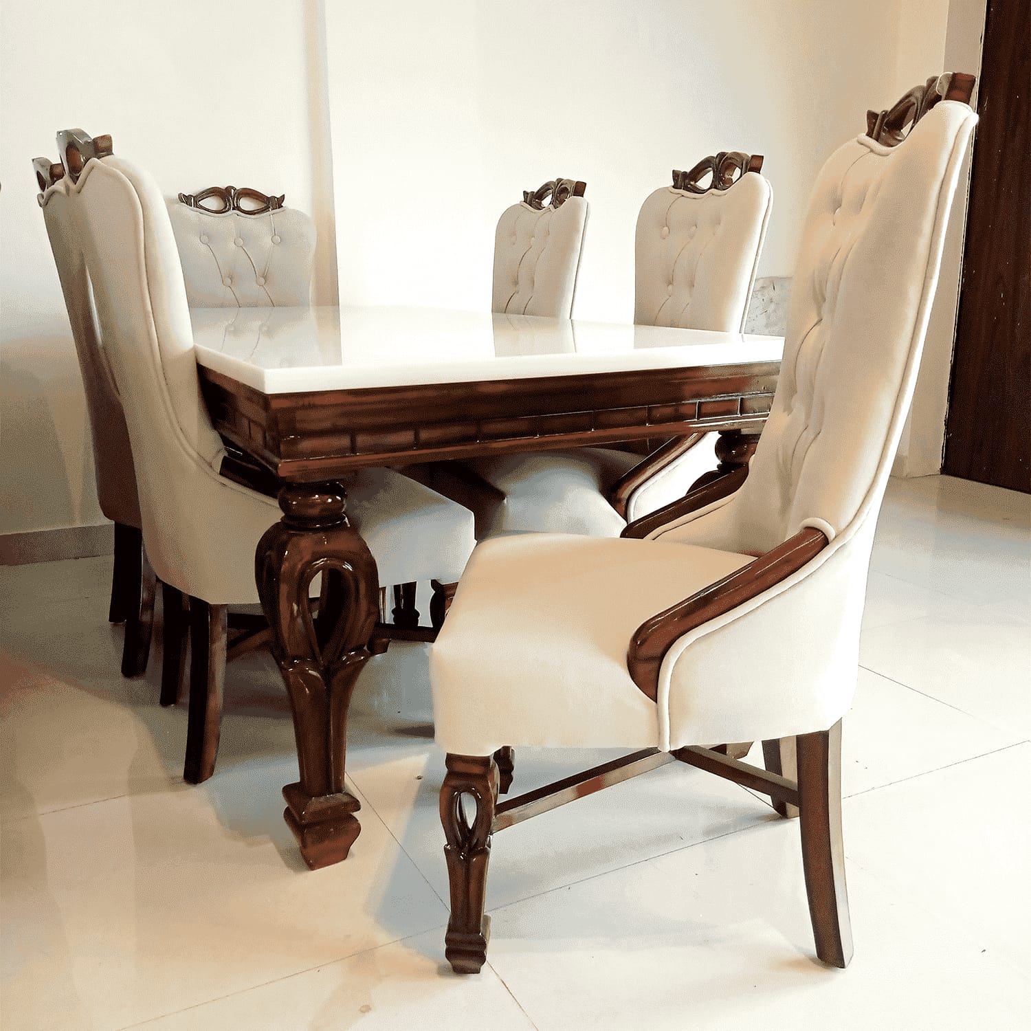 Classic marble dining set at the Little Star showroom in New Delhi