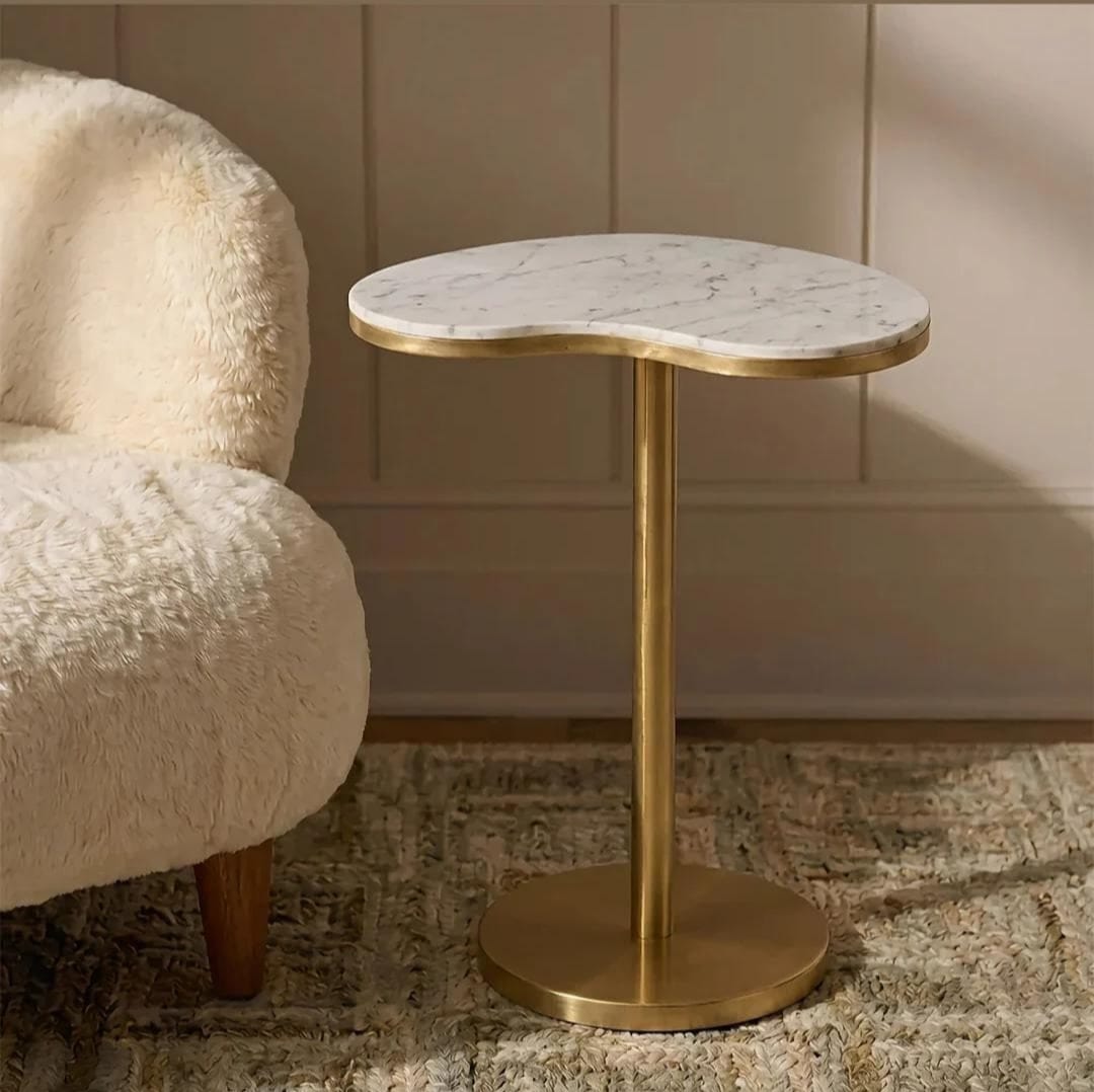 Kidney shaped white marble side table with brushed gold pedestal