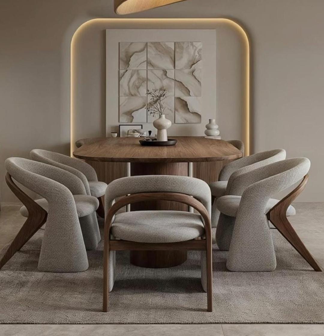 Oval wooden dining table with sculptural boucle chairs