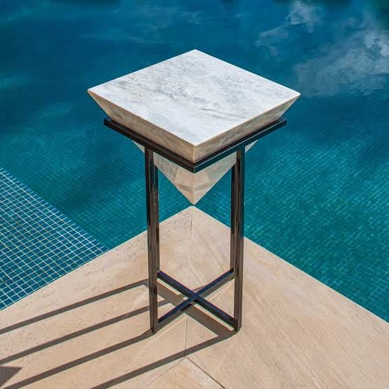 Square white marble side table with inverted pyramid black metal base